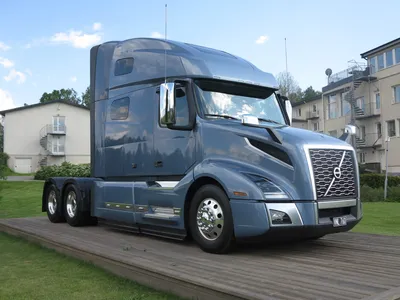 Volvo VNL64T 670 Highway truck tractor with 65″ Sleeper Cab and  semi-trailer-low-frame treller Rogers Ultima CR500 — Каталог К.В.Х.