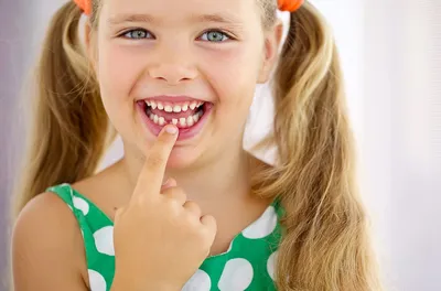 Молочные зубы у детей: схема выпадения, сроки, фото