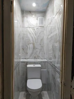 Ремонт в туалете пластиковыми панелями - 60 фото
