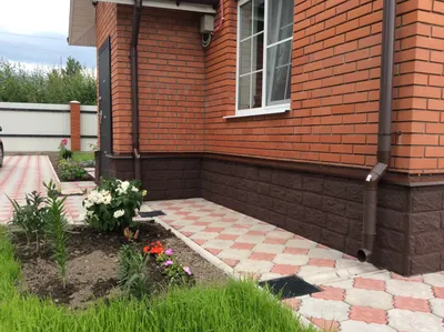 Облицовка цоколя дома в Мурманске