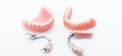 Съемное протезирование зубов в СПб - полное, частичное: цены