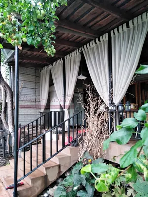 Лёгкие шторы на открытую веранду частного дома в Подстёпках.