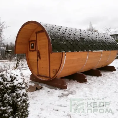 Баня-бочка из кедра длиной 5,5 метров с козырьком по цене 375000 рублей