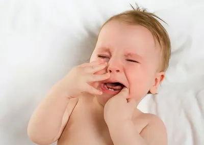 Как облегчить прорезывание зубов ребенку?
