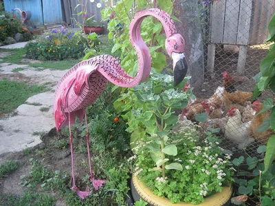 Flamingo.made from tires | Diy garden decor, Diy garden, Tyres recycle