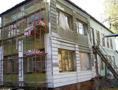 Мокрый фасад: утепление каменного дома под штукатурным слоем