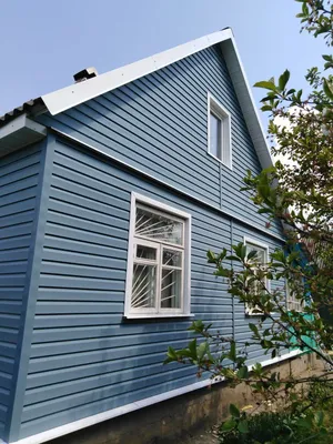 Строительство каркаса для дома из сайдинга Альта-профиль серо-голубой  выполнено компанией siding22