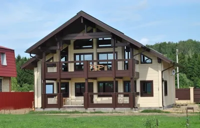 Внешняя отделка деревянного дома фото