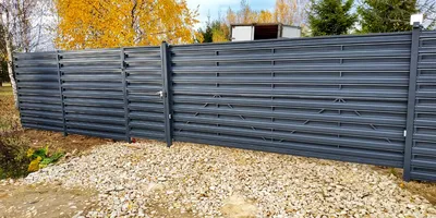 Забор из евроштакетника горизонтальный,цена с установкой от компании  \"Русский Забор\".