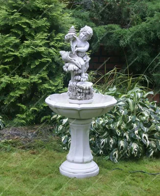 Декоративные фонтаны FG1315 - Напольный садовый фонтан. Амур - сын Афродиты  и бог любовного влечения по совместительству, с морскими раковинами на  небольшом постаменте