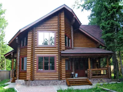 Деревянные дома из бревна проекты фото