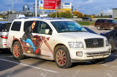 Moscow, Russia - September 29, 2012: Tuned Offroad Car Infiniti QX56 In The  City Street. Stock Photo, Picture And Royalty Free Image. Image 142310344.