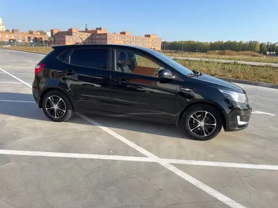 KIA Rio 4 (FB) цвет Phantom Black MZH с нижним сплиттером на бампер | фото KIA  Rio