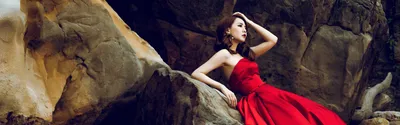 Обои Красная юбка Азиатская девушка, скалы, поза 3840x2160 UHD 4K  Изображение
