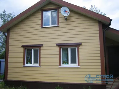 Наружная отделка домов фиброцементным сайдингом в Ленинградской области