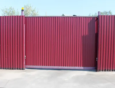 Конструкция откатных ворот из металлопрофиля и особенности их изготовления