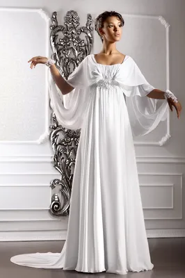 Невеста в белом прямом платье в греческом стиле с лифом с драпировкой и  поясом из бисера под фото 998263 - Свадебный салон \"Радость\"