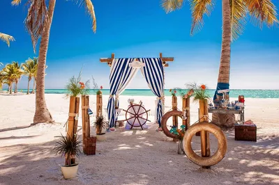 Символическая свадьба в Доминикане на диком пляже в морском стиле