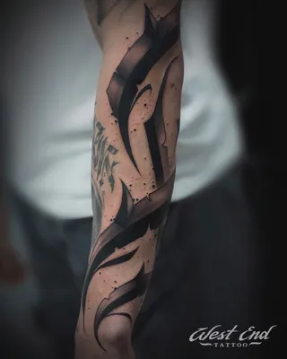 Мужские тату в стиле трайбл: фото татуировок трайбл для мужчин