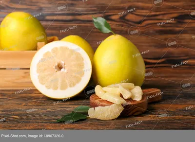 Sweet ripe pomelo fruit on white background :: Стоковая фотография ::  Pixel-Shot Studio