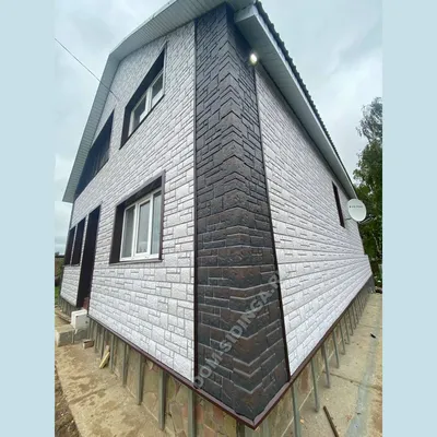Панели для отделки фасадов частных домов: цементные, терракотовые,  полиуретановые