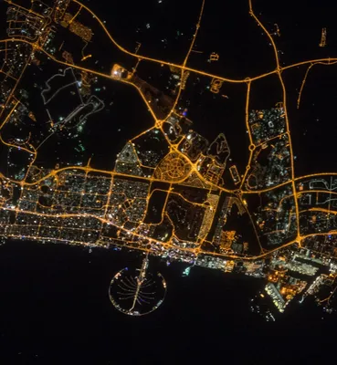 Вид ночного Дубая из космоса