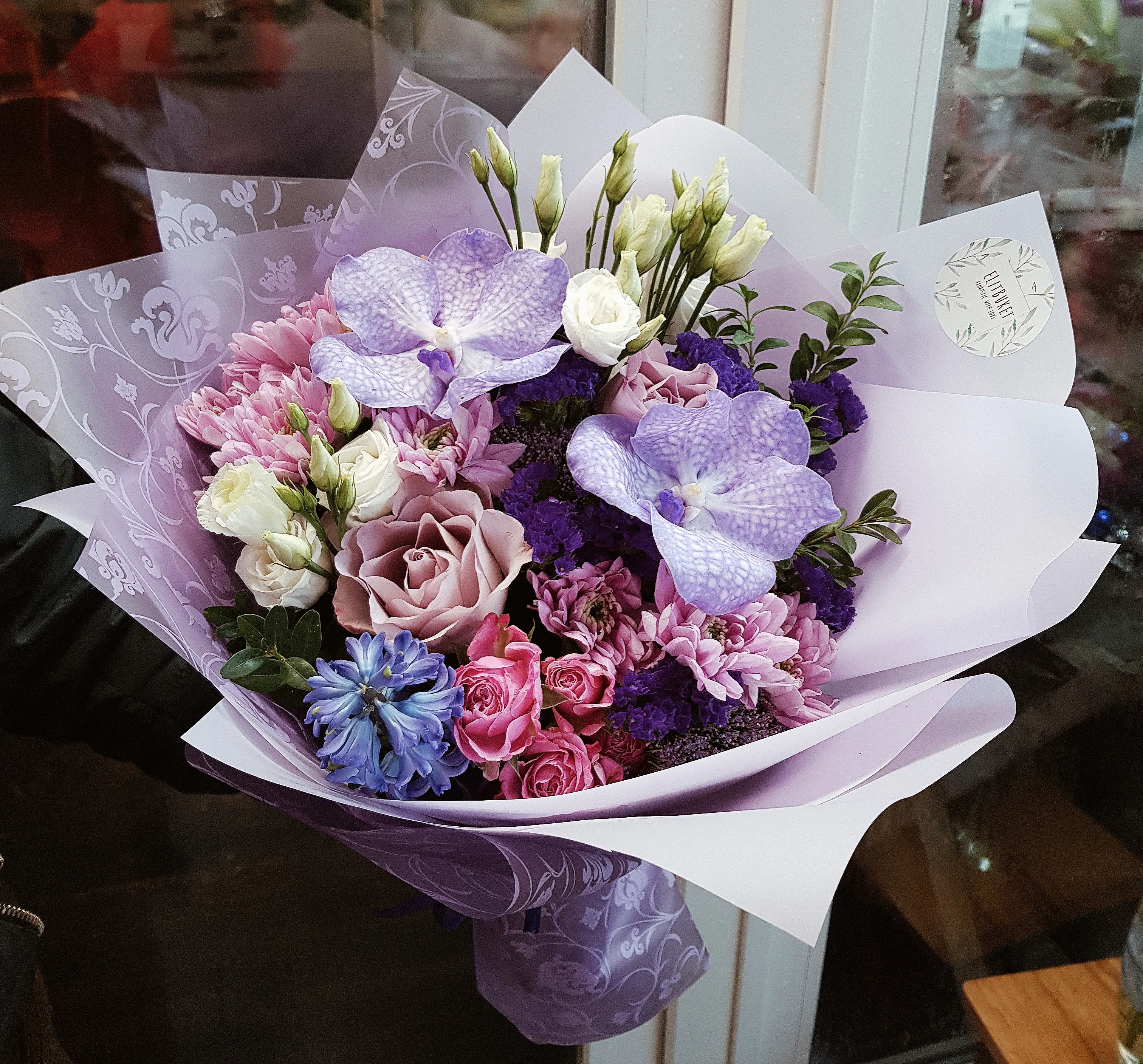 Букет с фиолетовой орхидеей Ванда