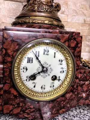 Старые антикварные часы на синем деревянном фоне. Stock Photo | Adobe Stock