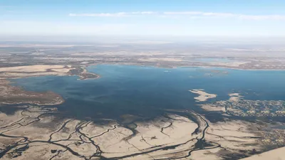 Сравнение: Аральское море с узбекской и казахстанской стороны – ЛИВЕНЬ