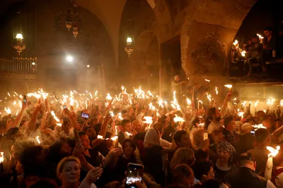 Схождение Благодатного огня в храме Гроба Господня в Иерусалиме - РИА  Новости, 23.04.2022