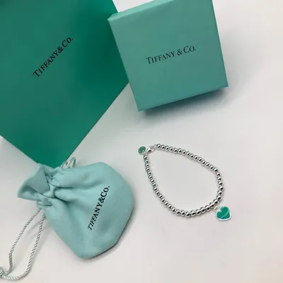 Браслет Tiffany T Wire с перламутром купить в Москве за 215 000 руб.  Женские Желтое золото С историей