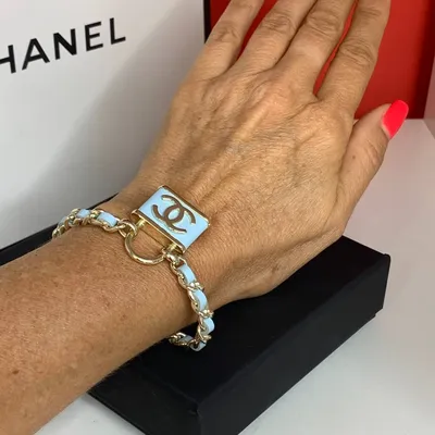 Брендовые браслеты Шанель в виде цепи с эмблемой, покрытой фианитами и  позолотойМагазин бижутерии МАРГО