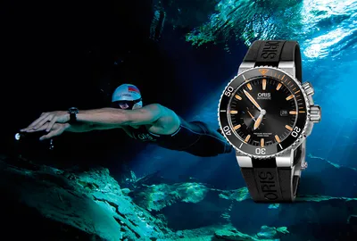 Oris - Часы Oris Aquis Date с циферблатом глубокого синего тона  предлагаются в корпусе разного размера*, который изготовлен из нержавеющей  стали и обладает водонепроницаемостью до 300 метров. Модель оснащёна  дайверским ободком с