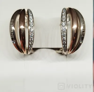 Серьги из белого золота в стиле damiani