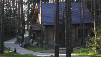 Срубы деревянных домов с террасой: особенности и цены