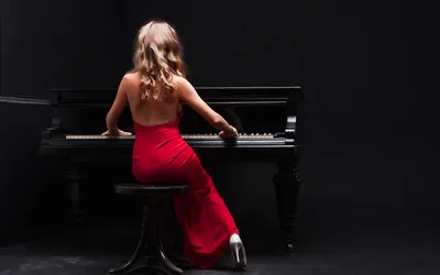 Девушка играет на пианино Stock Photo | Adobe Stock