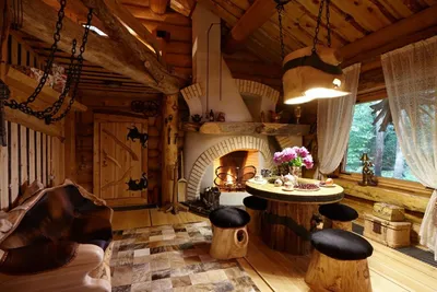 Дизайн интерьера дома из оцилиндрованного бревна 🪓 23 фото дизайна  уникального коттеджа в лесу