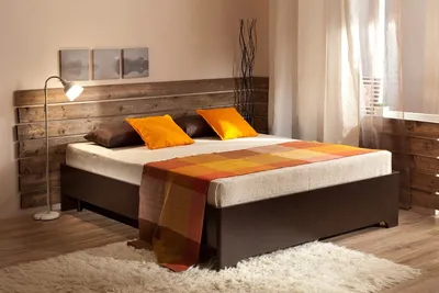Деревянная кровать или кровать с мягкой обивкой - что лучше?