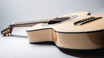 Желтая акустическая гитара на белом фоне Стоковое Фото - изображение  насчитывающей хобби, шнур: 146346922