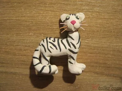 Симпатичный тигр из пластилина на белом фоне генеративный ai | Премиум Фото