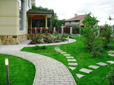 Ландшафтный дизайн загородного дома для красоты и разграничения участка
