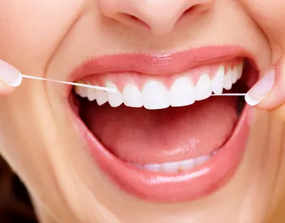 Неприятный запах под коронкой зуба: что делать, методы лечения
