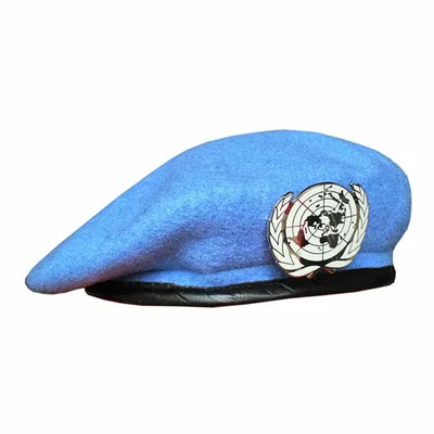 голубой берет миротворцев организации объединенных наций Редакционное Фото  - изображение насчитывающей усилие, логос: 228083661