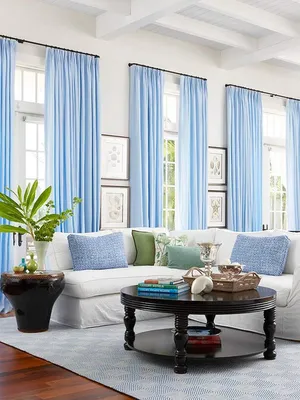Голубые шторы в интерьере гостиной - 69 фото