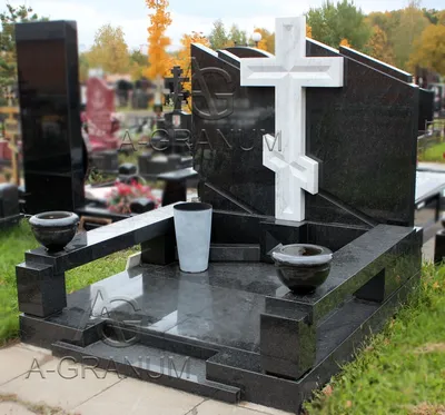 Купить памятник крест Владимир из черного гранита с установкой на могилу.