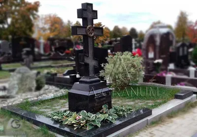 Купить памятник крест Владимир из черного гранита с установкой на могилу.