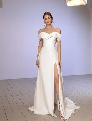 Элегантное свадебное платье с разрезом купить в Москве