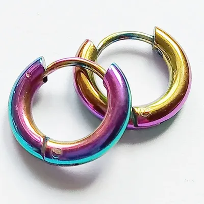 Сережки-кольца: модное воплощение 70-х на современных подиумах