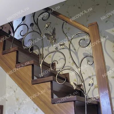 Кованые перила для лестницы в частном доме в Казани