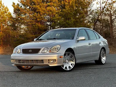 Car, Lexus GS 300, model year 2005-, silver-green, upper middle-sized ,  Limousine, standing, upholding, diagonal from the front Stock Photo - Alamy